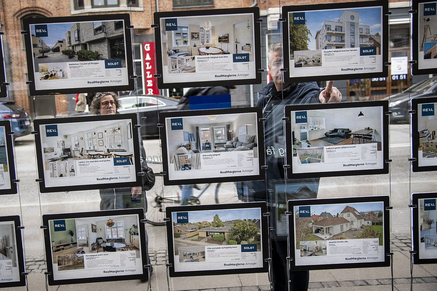 Property listings in an estate agent’s window.