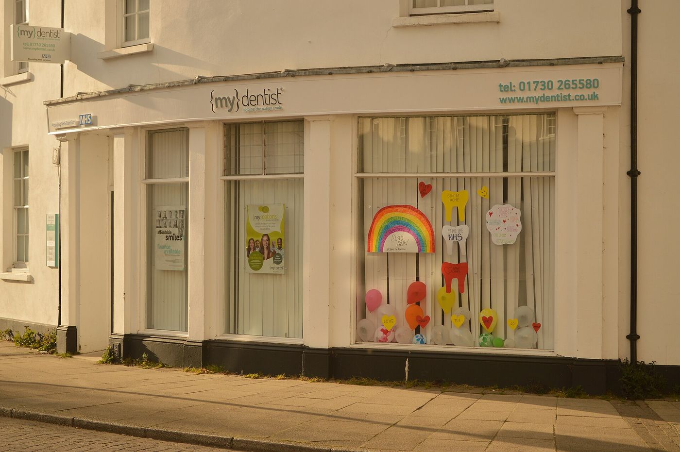 An NHS dental surgery sign in England.