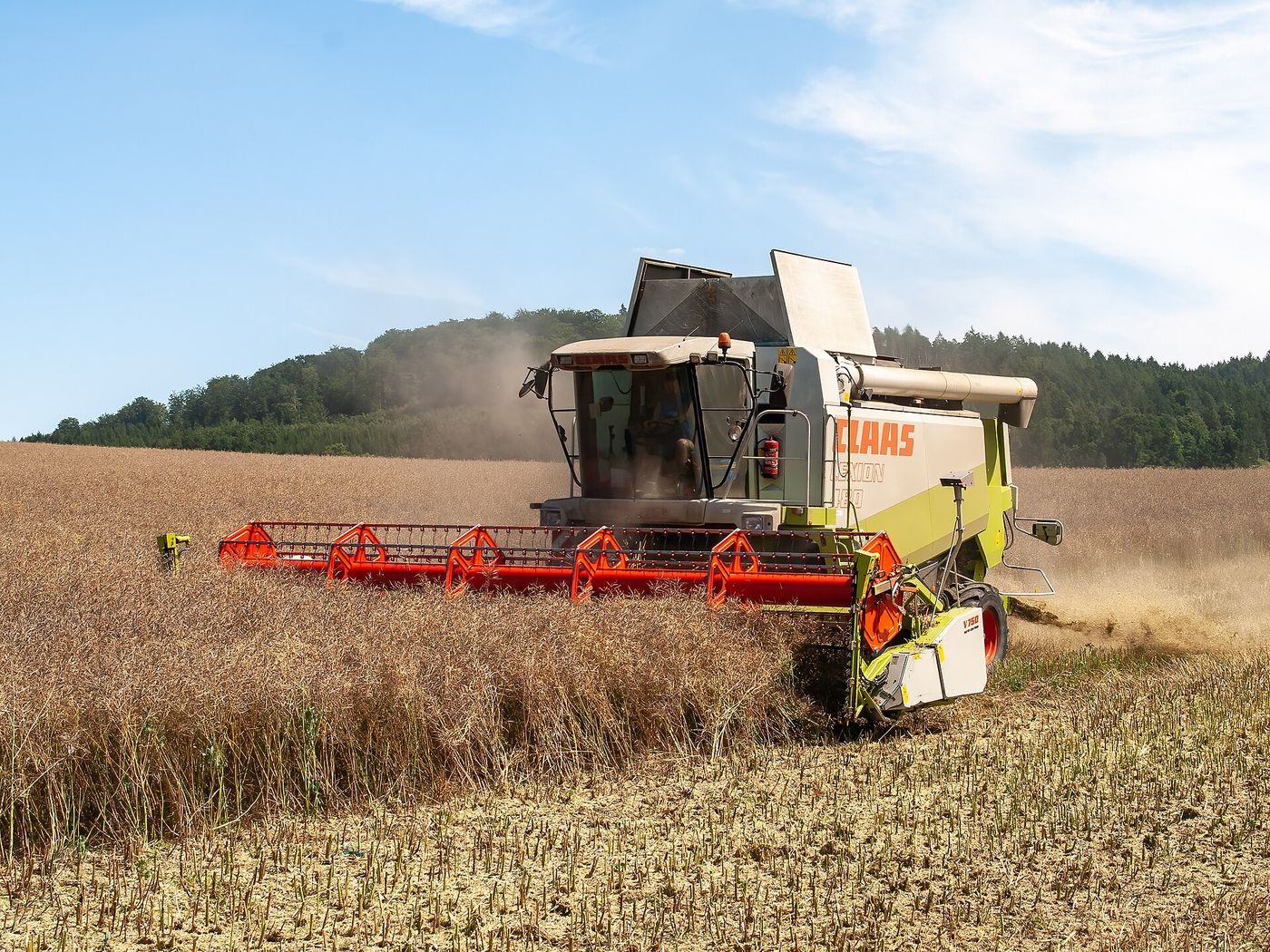 A combine harvester at work in a wheat field in Lincolnshire.