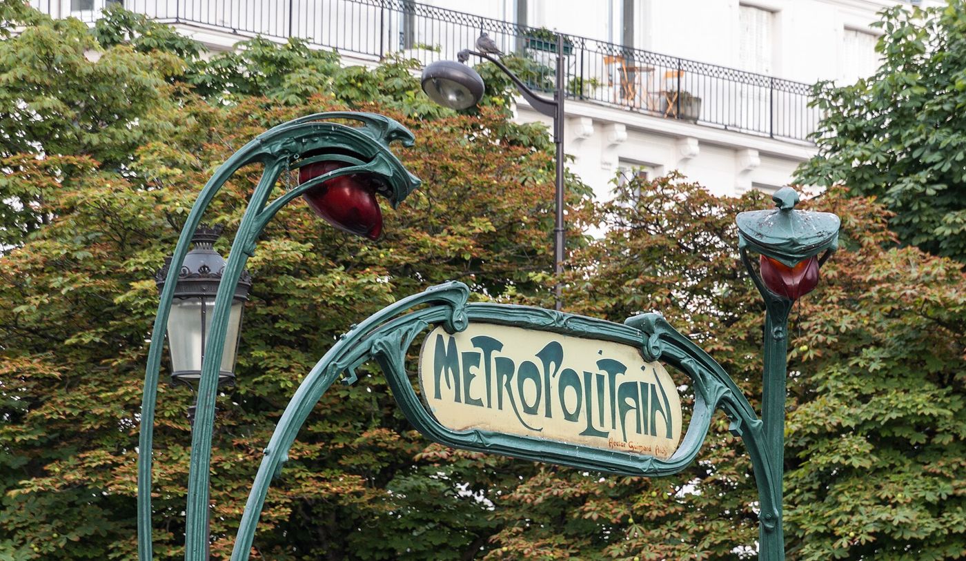 A new metro train at a suburban station on the Grand Paris Express network.