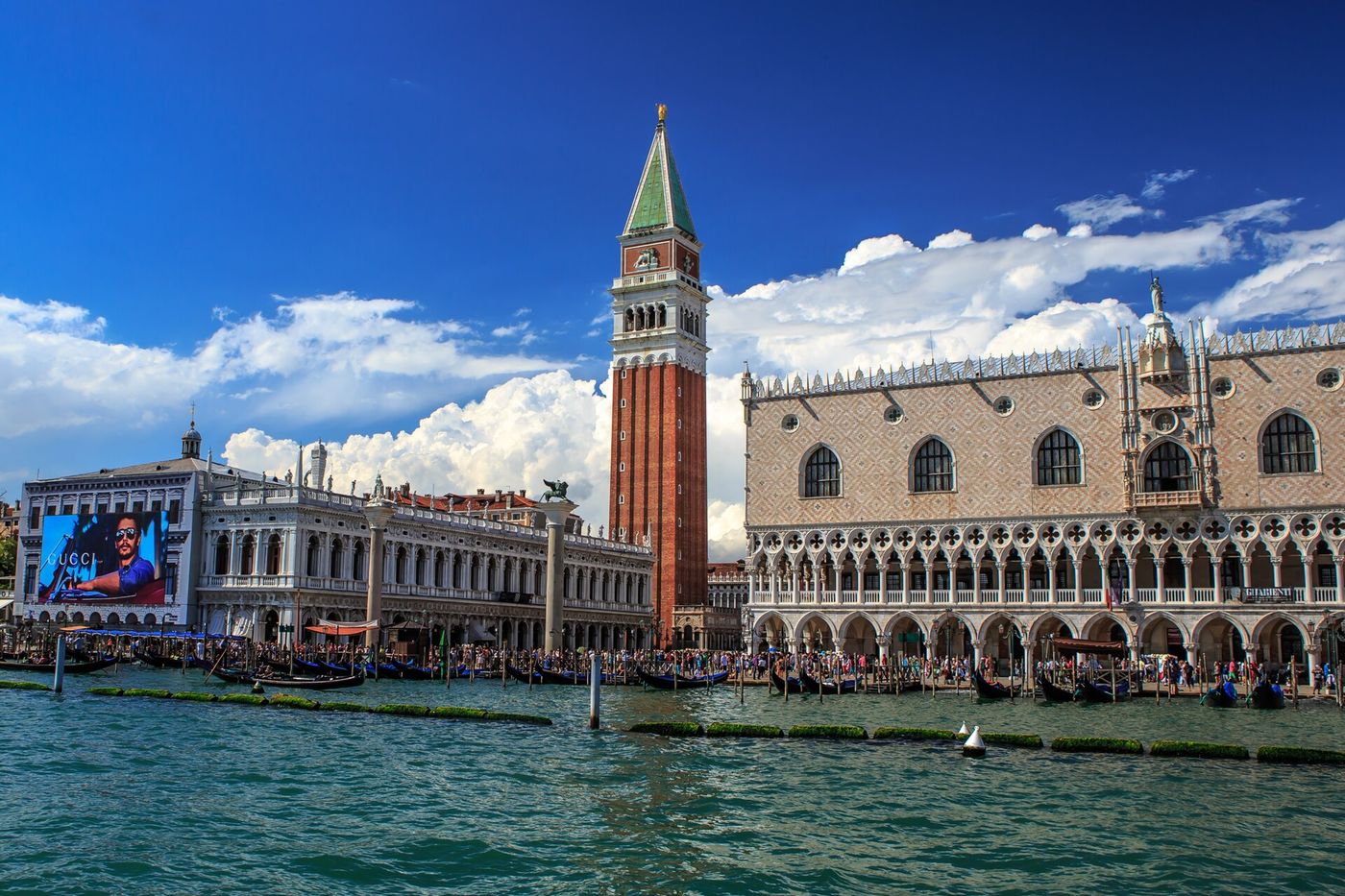 Visitors cross St Mark's Square in Venice.