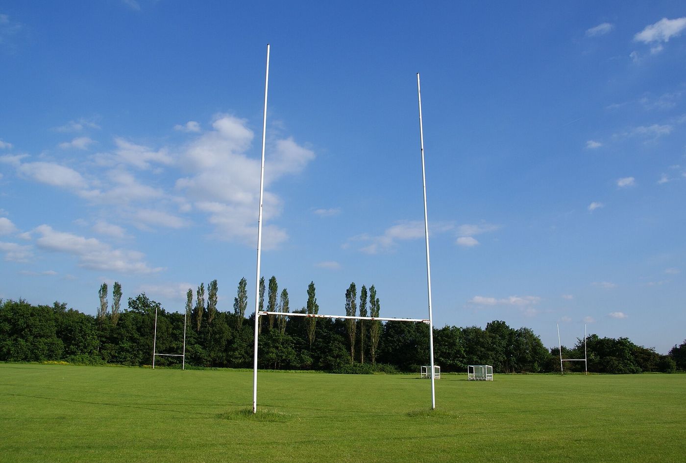 Rugby posts at a community club ground.